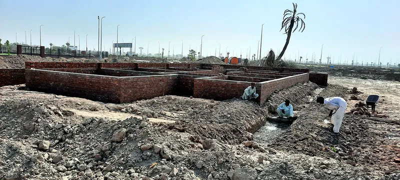 House 126 Sector R DHA Multan foundation brickwork plinth level wide site view