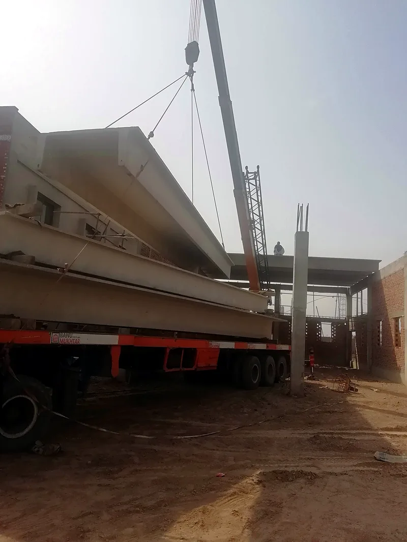 Material Lab NFC IET Multan precast girder loading by crane 2019 by The Niaz Builders